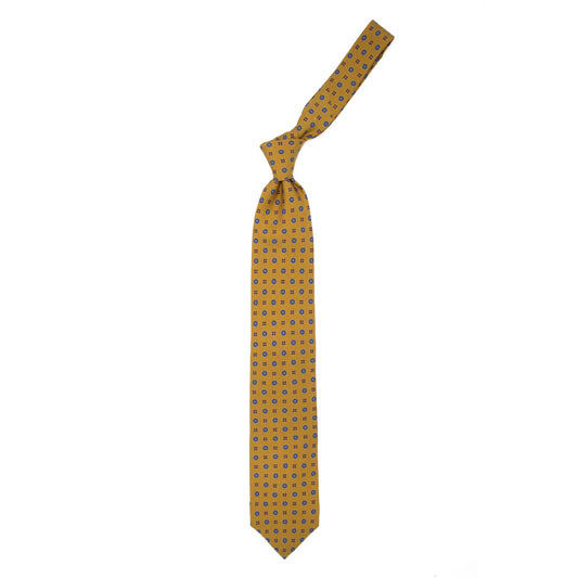 Mustard tie with blue and brown flowers