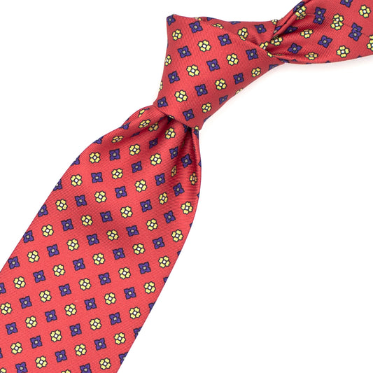 Red tie with yellow and blue flowers