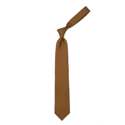 Mustard tie with brown abstract pattern