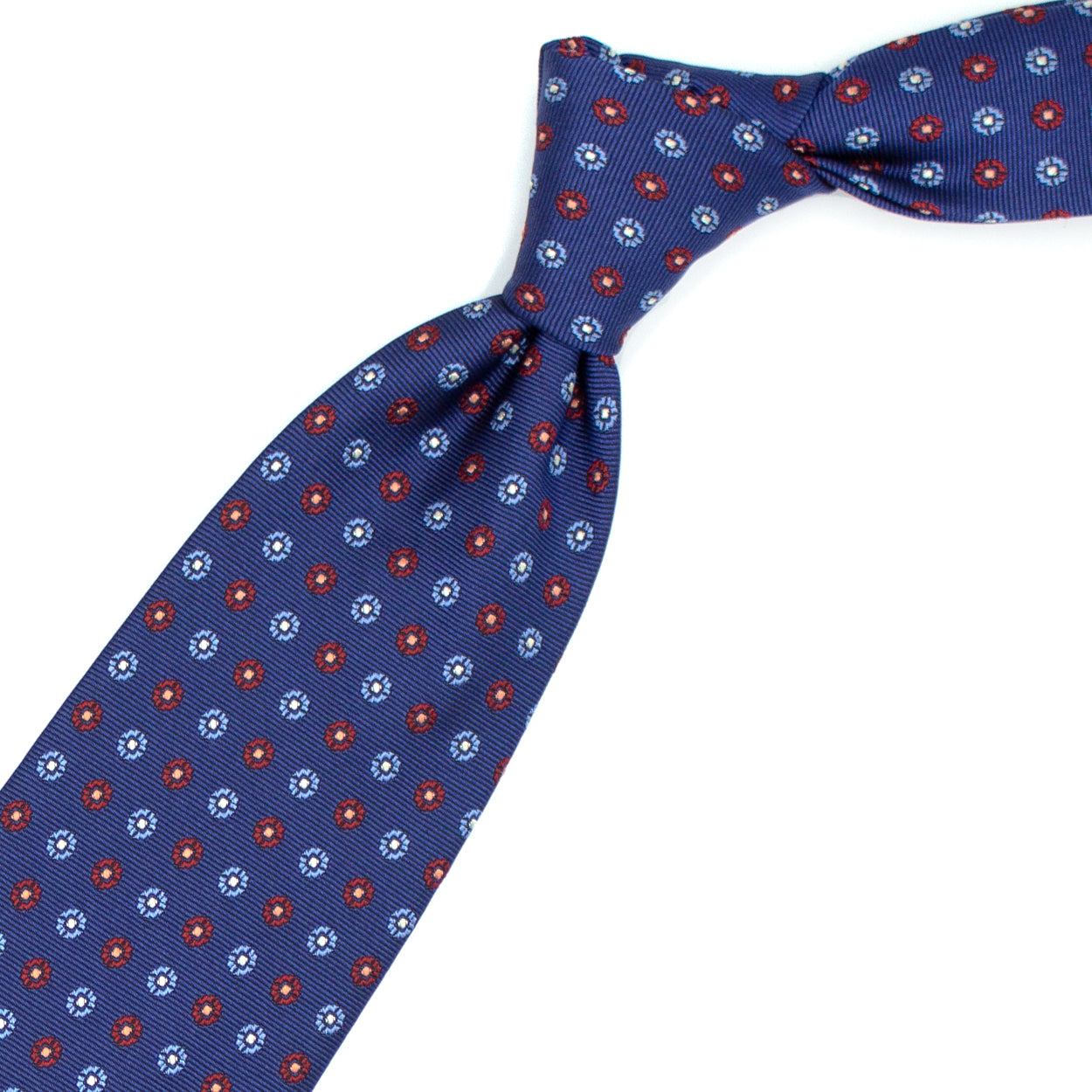 Blue tie with blue and red flowers and white squares