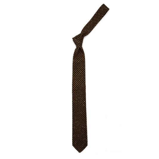 Brown tie with white dots