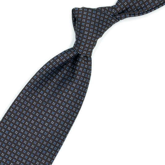 Brown tie with light blue geometric pattern