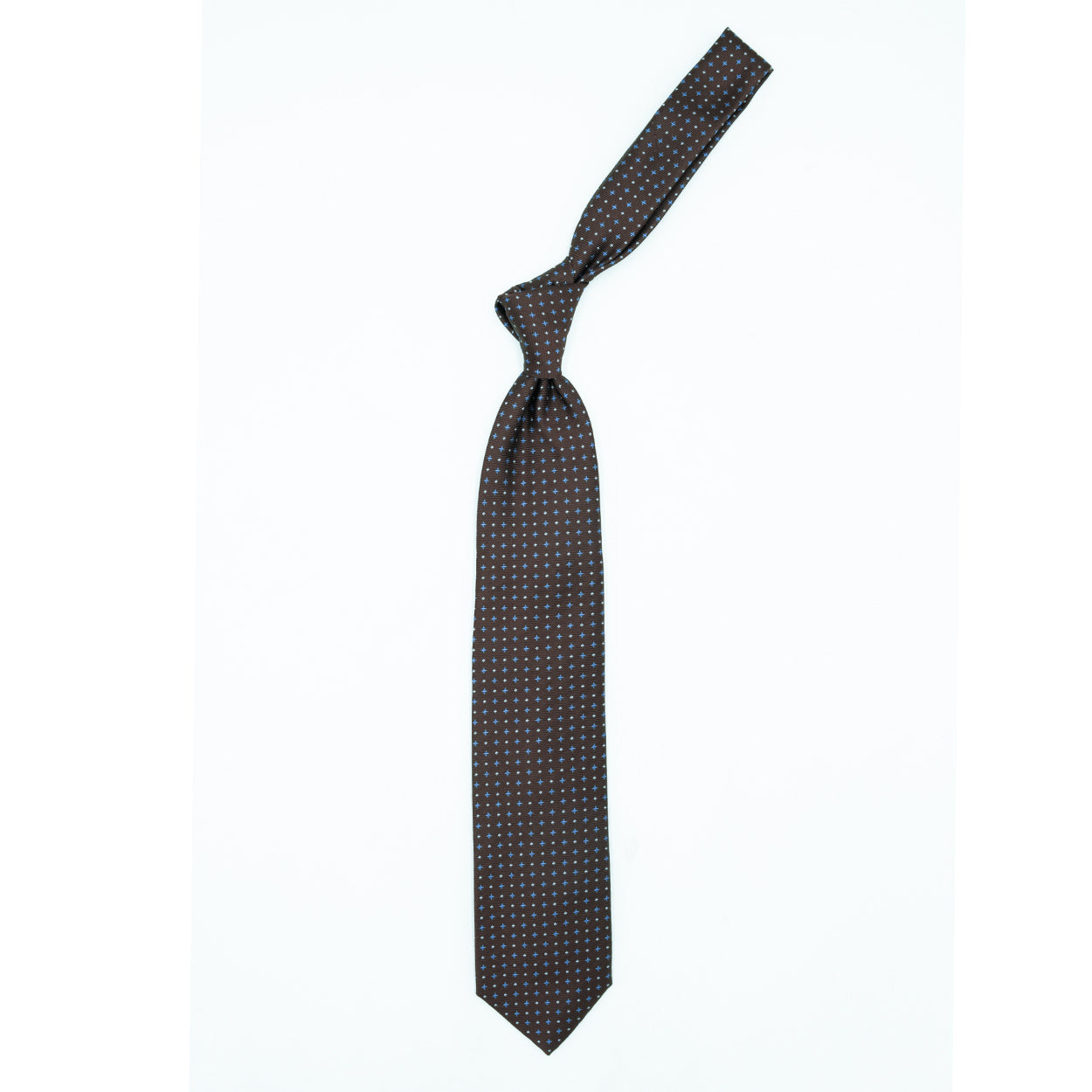 Brown tie with blue crosses and white dots