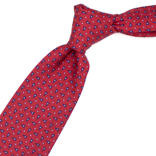 Red tie with blue triangles and blue dots