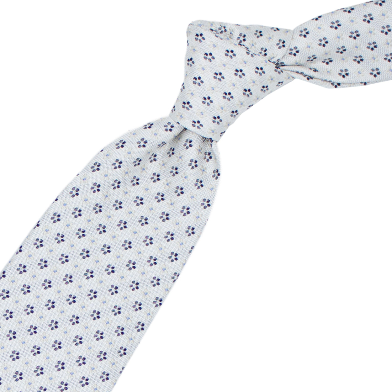 White tie with white and grey flowers and blue dots