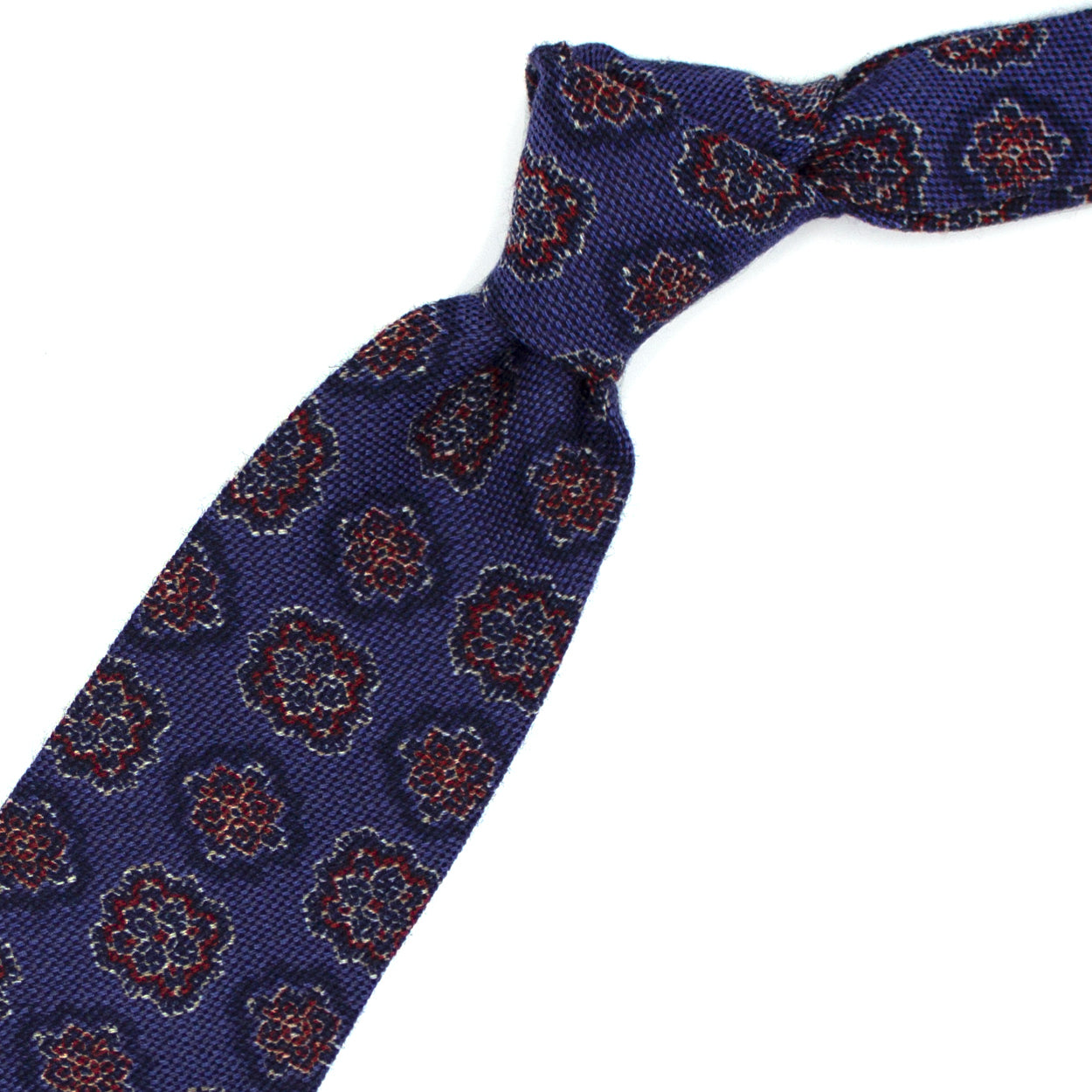 Blue tie with blue and red medallions