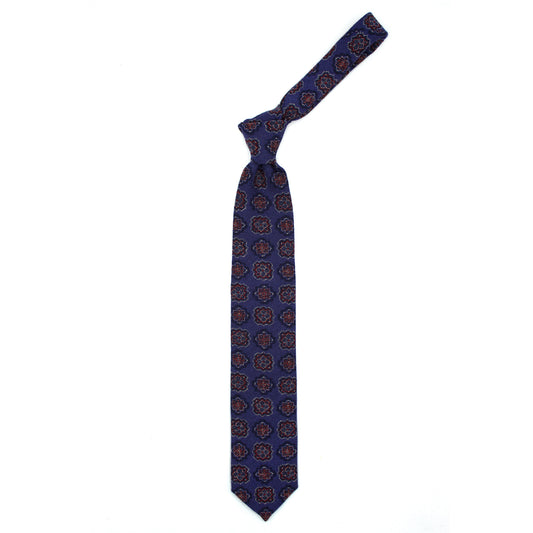 Blue tie with blue and red medallions