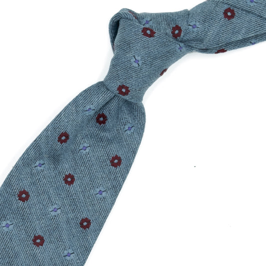 Light blue tie with blue and red flowers and purple dots