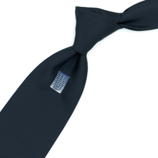 Blue tie with blue Ulturale logo on the sub-knot