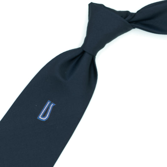 Blue tie with Ulturale logo in blue and white on the sub-knot