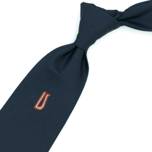 Blue tie with Ulturale logo in red, orange and white on the sub-knot