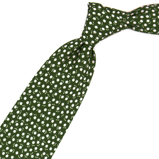 Green tie with white flowers
