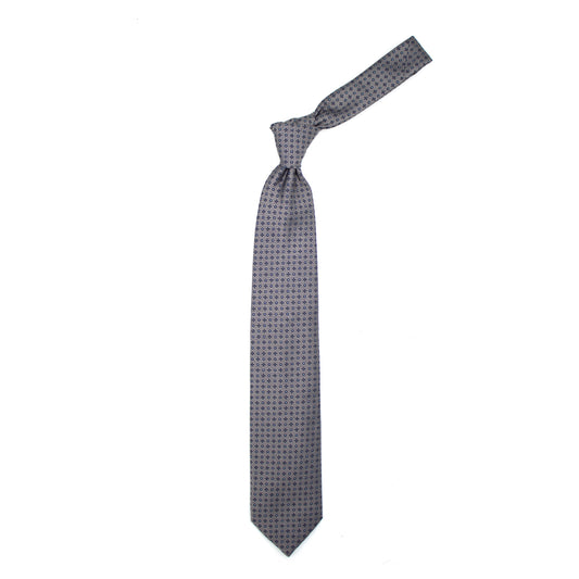 Grey tie with blue diamonds and circles and blue dots