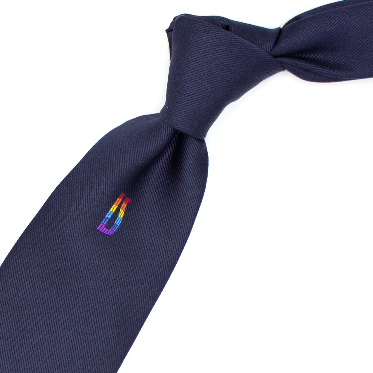 Blue tie with rainbow Ulturale monogram on the sub-knot
