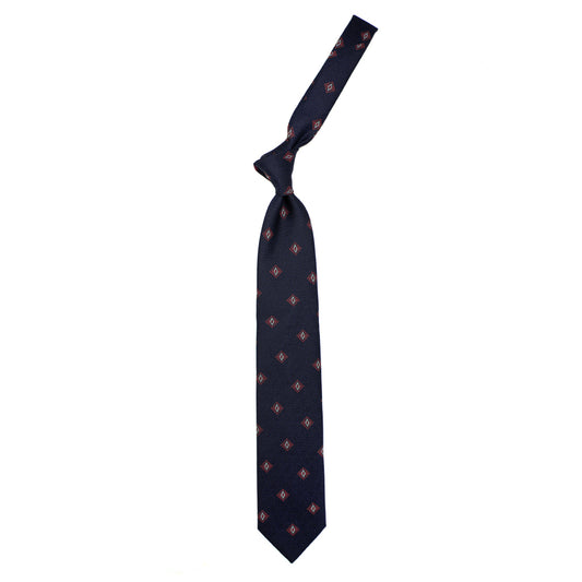 Blue tie with red and white geometric pattern