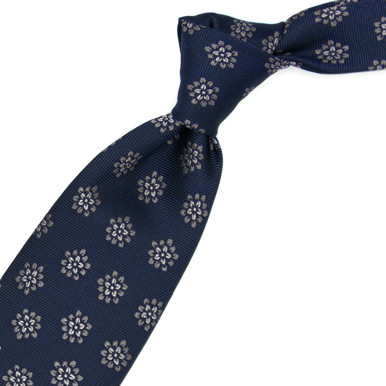 Blue tie with grey flowers