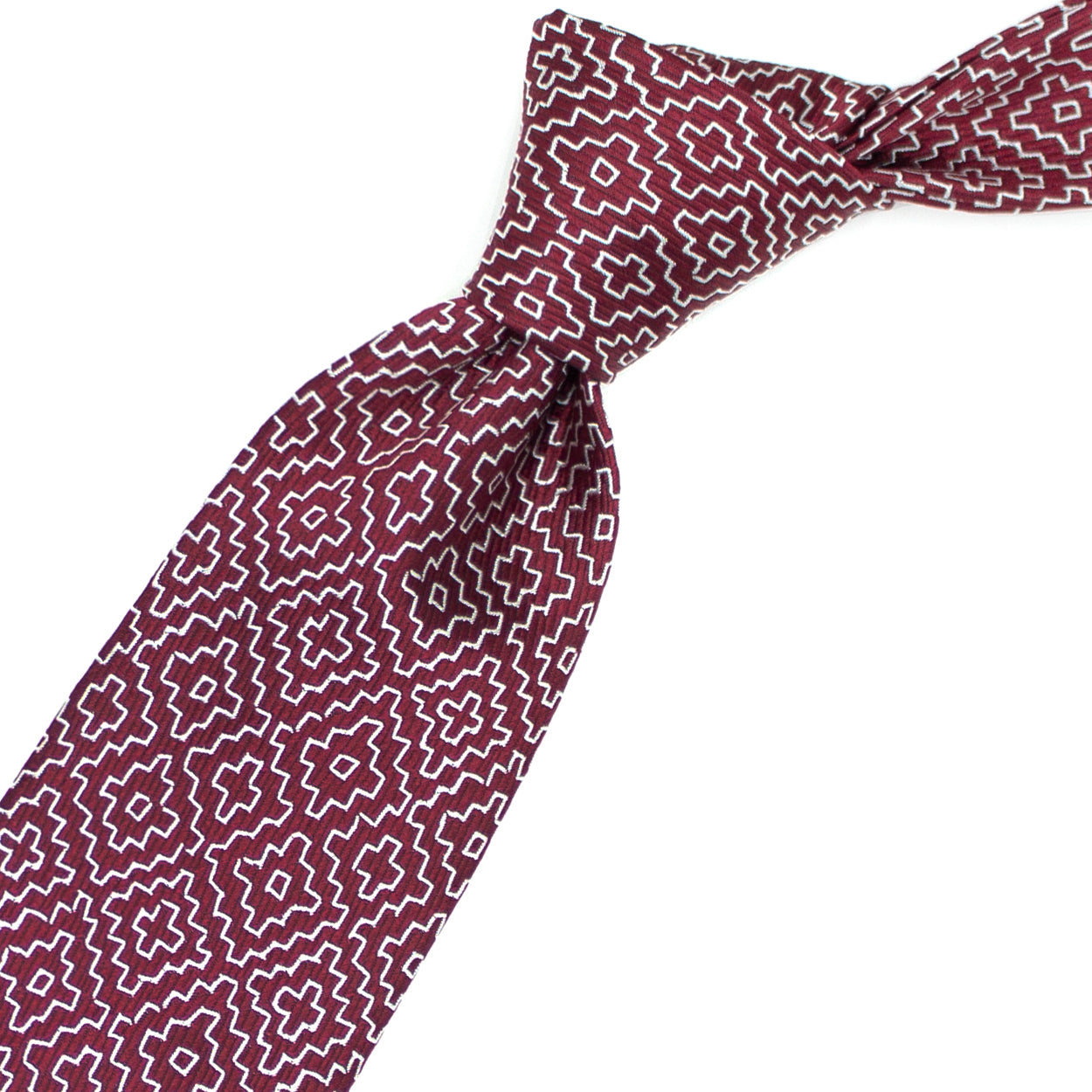 Red tie with white geometric pattern