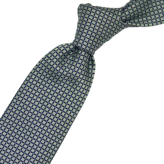 Tie with blue, gold and light blue geometric pattern