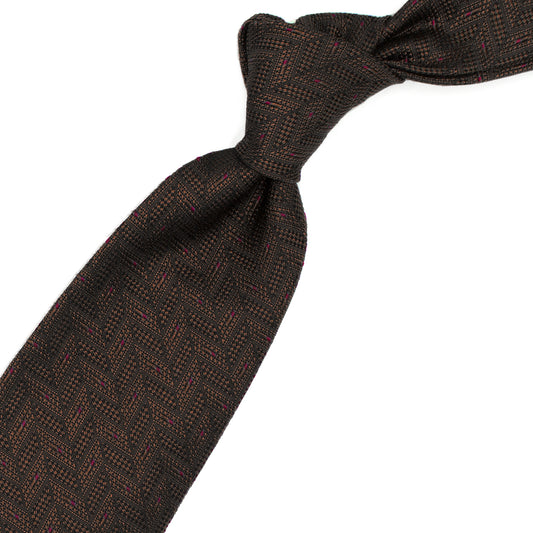 Brown tie with tone-on-tone geometric pattern and red dots