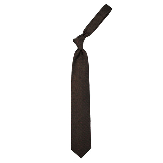 Brown tie with tone-on-tone geometric pattern and red dots