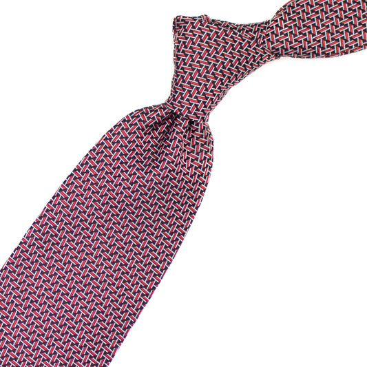 Tie with red, white and black geometric pattern