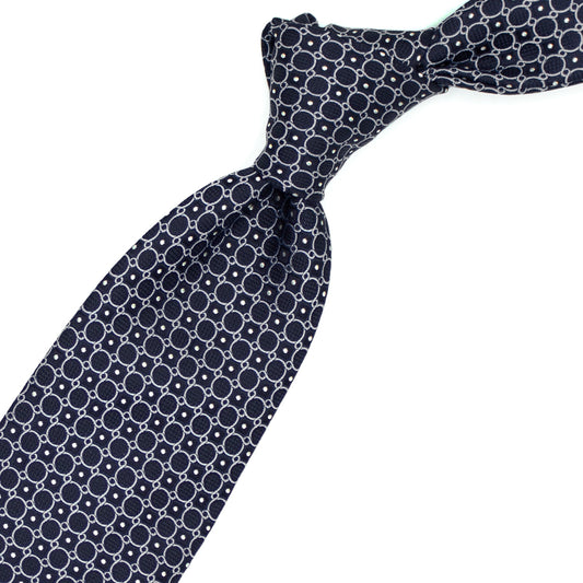 Blue tie with white circles and dots