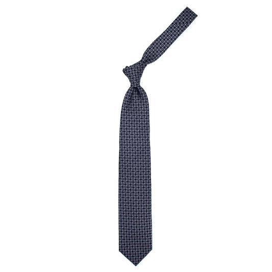 Blue tie with white circles and dots