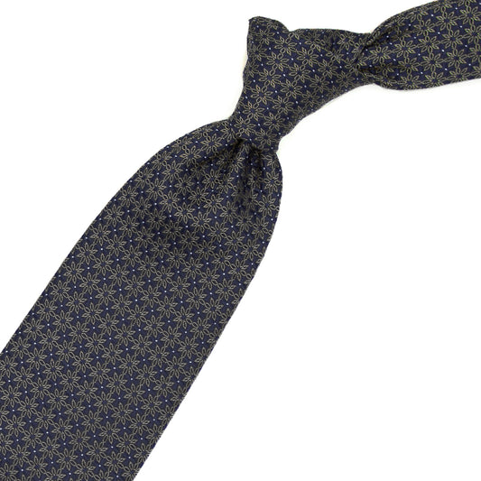 Blue tie with grey flowers and white dots