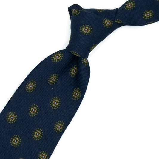 Blue tie with green medallion flowers
