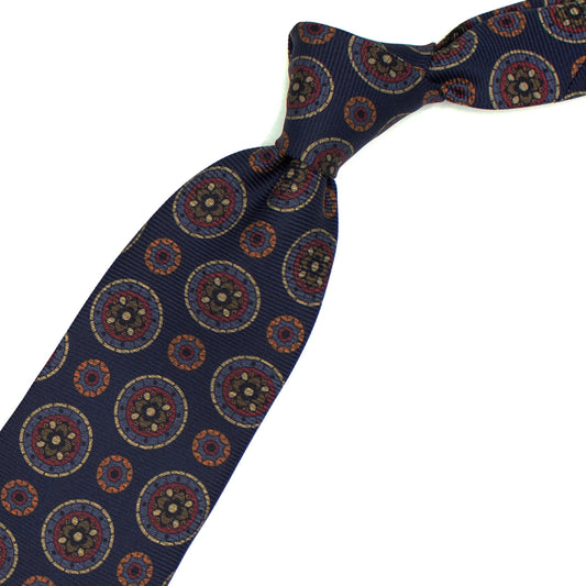 Blue tie with coloured medallions