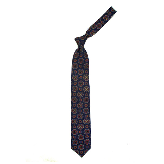 Blue tie with coloured medallions