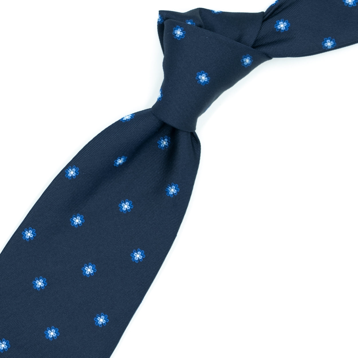 Blue tie with blue and bluette flowers and white dots