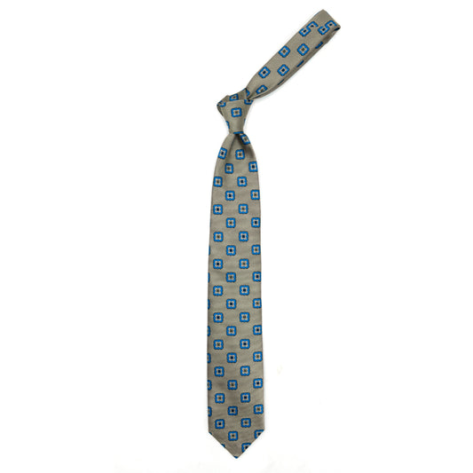 Beige tie with blue flowers and brown squares