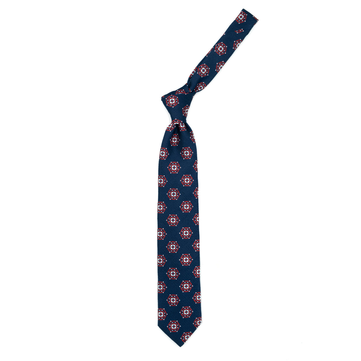 Blue tie with red and white medallions