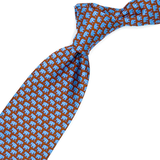 Orange tie with blue elephants