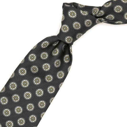 Grey tie with light grey medallions and yellow flowers