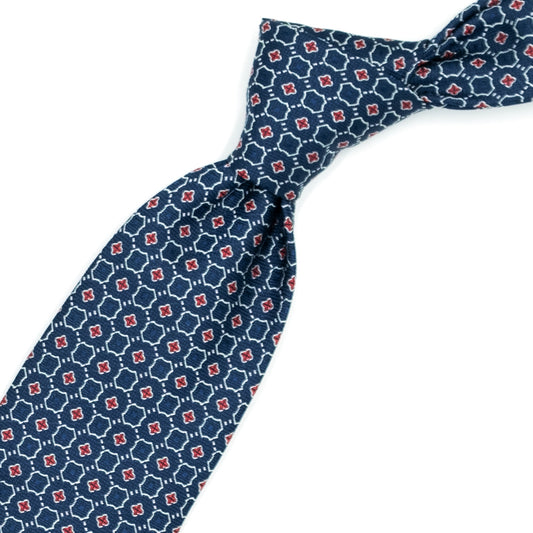 Blue tie with red and white pattern