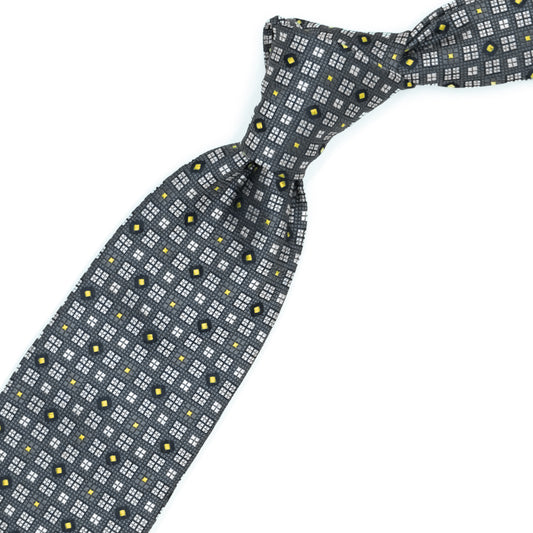 Grey tie with grey, yellow and blue squares