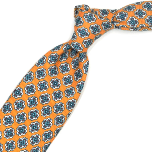 Orange tie with coloured medallions