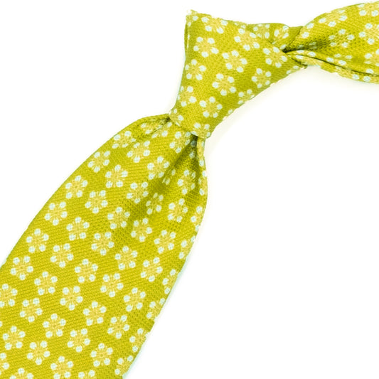Yellow tie with white flowers