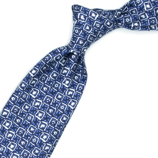 Blue tie with white and blue abstract pattern