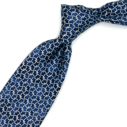 Blue tie with white abstract pattern