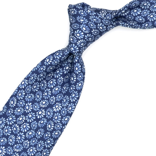 Blue tie with blue and white shaded flowers