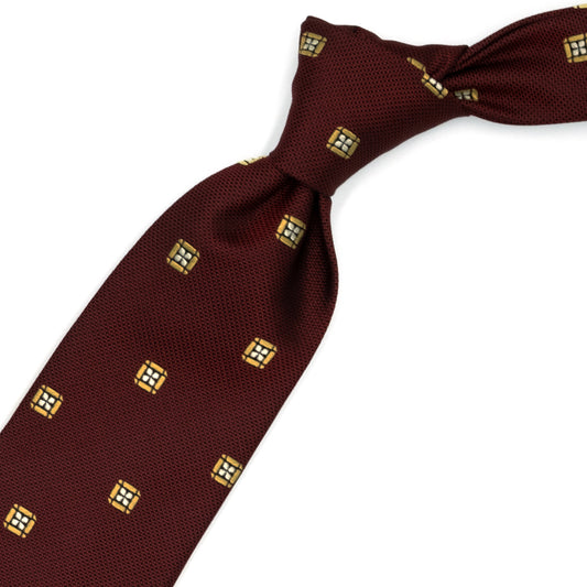 Red tie with yellow squares and white flowers