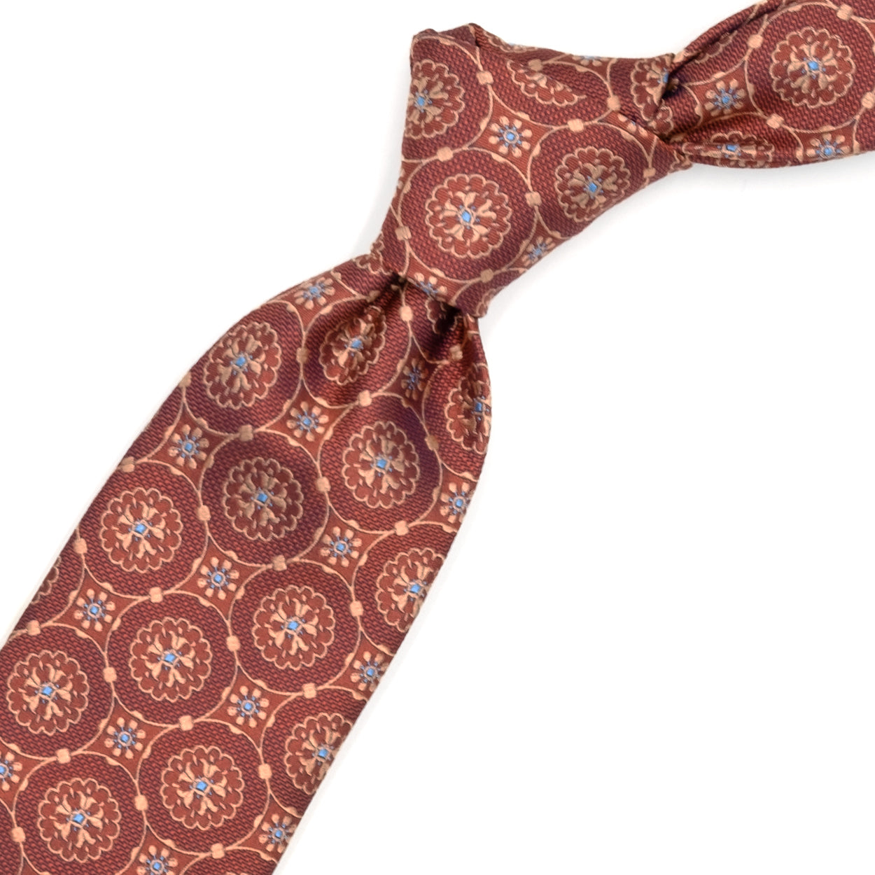 Orange tie with tone-on-tone medallions and blue dots