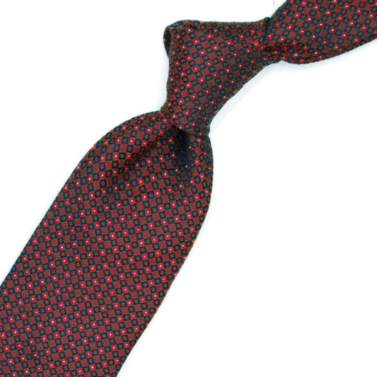 Bordeaux tie with blue squares and white dots