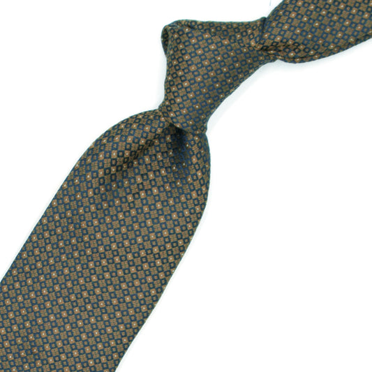 Brown tie with blue squares and white dots