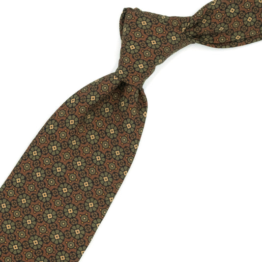 Rust tie with green and brown medallions