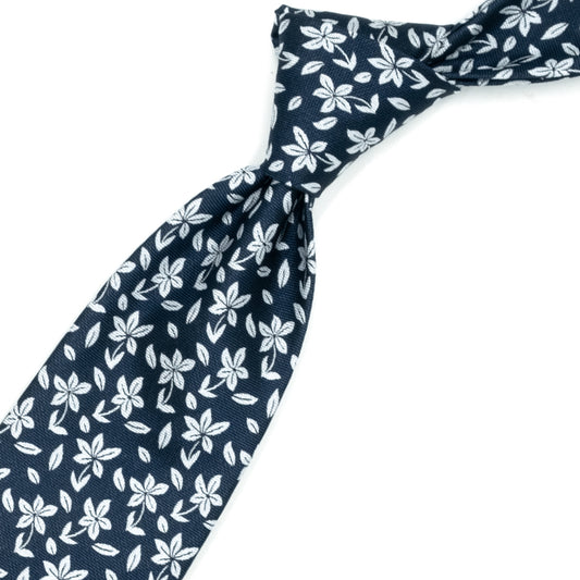 Blue tie with grey flowers