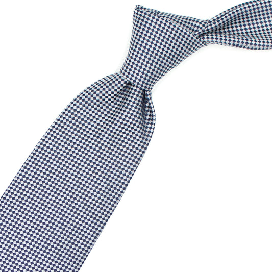 Woven tie with blue and white squares
